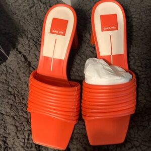 Dolce Vita orange slides with 3 inch block heel